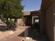 Inviting front entrance featuring desert landscaping, a stone pathway, and a double-door entryway at 15135 E Sundown Dr, Fountain Hills, AZ 85268