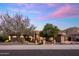 Beautiful single-story home with desert landscaping and mountain views at sunset at 15135 E Sundown Dr, Fountain Hills, AZ 85268