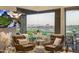 Comfortable sitting area offering luxurious chairs, a scenic view, and stylish interior décor at 15135 E Sundown Dr, Fountain Hills, AZ 85268