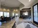 Spacious living area with travertine floors, a pool table, and an open layout for entertaining at 15135 E Sundown Dr, Fountain Hills, AZ 85268
