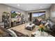 Spacious living room with a sliding glass door to a balcony and views to a desert landscape at 15135 E Sundown Dr, Fountain Hills, AZ 85268