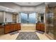 Luxurious main bathroom features dual vanities, soaking tub, and a separate glass enclosed shower at 15135 E Sundown Dr, Fountain Hills, AZ 85268