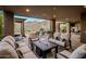 Inviting outdoor patio with comfortable seating, a grill, and scenic mountain views at 15135 E Sundown Dr, Fountain Hills, AZ 85268