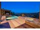 Inviting pool and spa with a hillside view create a relaxing outdoor oasis at dusk at 15135 E Sundown Dr, Fountain Hills, AZ 85268