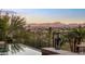 Infinity pool with wrought iron fencing delivers amazing scenic views of the desert and mountains at 15135 E Sundown Dr, Fountain Hills, AZ 85268