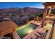 Inviting backyard pool and spa area with built-in BBQ and mountain views, perfect for outdoor entertaining at 15135 E Sundown Dr, Fountain Hills, AZ 85268
