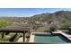 Inviting swimming pool with a pergola and hot tub overlooking picturesque mountains and desert landscape at 15135 E Sundown Dr, Fountain Hills, AZ 85268