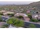 Home situated on quiet street with mature trees and desert landscaping at 15135 E Sundown Dr, Fountain Hills, AZ 85268