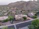 Home situated on quiet street with mature trees and desert landscaping at 15135 E Sundown Dr, Fountain Hills, AZ 85268