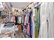 Spacious walk-in closet, providing ample storage space for clothes, shoes, and accessories at 15633 W Acapulco Ln, Surprise, AZ 85379