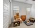 Neutral bedroom with window blinds, a ceiling fan, boxes, and room to make this space your own at 16566 W Saguaro Park Ln, Surprise, AZ 85387