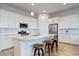 Bright and spacious kitchen with ample counter space, perfect for cooking and entertaining at 16566 W Saguaro Park Ln, Surprise, AZ 85387