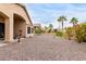 Desert backyard featuring gravel, mature landscaping, and privacy at 17132 E Hillcrest Dr, Fountain Hills, AZ 85268
