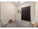 This bedroom has neutral paint and carpet, a window for natural lighting, and a nearby doorway at 17132 E Hillcrest Dr, Fountain Hills, AZ 85268