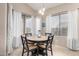 Bright breakfast nook featuring natural light and a table with seating for four at 17132 E Hillcrest Dr, Fountain Hills, AZ 85268