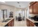 Kitchen showcases granite counters and a breakfast nook with natural light at 17132 E Hillcrest Dr, Fountain Hills, AZ 85268
