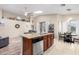 Kitchen showcasing granite counters, stainless appliances, and views of the living room and breakfast nook at 17132 E Hillcrest Dr, Fountain Hills, AZ 85268