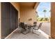 Covered patio featuring a table and chairs, perfect for outdoor dining and relaxation at 17132 E Hillcrest Dr, Fountain Hills, AZ 85268