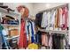 Spacious walk-in closet with multiple shelves and rods for clothing and storage solutions at 18422 W Clinton St, Surprise, AZ 85388