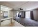 Inviting living room featuring gray walls, neutral carpet and a ceiling fan at 205 S Higley Rd # 286, Mesa, AZ 85206