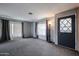 Spacious living room featuring carpeted floors, large windows and lots of natural light at 205 S Higley Rd # 286, Mesa, AZ 85206