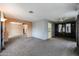 Open living room featuring carpeted floors that flow seamlessly into other living areas at 205 S Higley Rd # 286, Mesa, AZ 85206