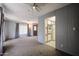 Bright living room featuring carpeted floors flowing seamlessly to the well-equipped kitchen at 205 S Higley Rd # 286, Mesa, AZ 85206