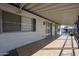 A covered patio with tile floor offers an ideal outdoor space for relaxing and entertaining at 205 S Higley Rd # 286, Mesa, AZ 85206