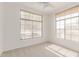 Bedroom features natural light with neutral carpet at 2140 S Benton Cir, Mesa, AZ 85209