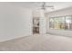 Primary bedroom offers bright natural light and easy access to a flex space at 2140 S Benton Cir, Mesa, AZ 85209