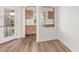 Dining room with recessed shelving, natural light, and new wood floors at 2140 S Benton Cir, Mesa, AZ 85209