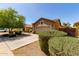 Single-Gathering home with desert landscaping, a two-car garage and a fenced backyard at 2140 S Benton Cir, Mesa, AZ 85209
