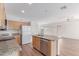 Bright kitchen with granite counters, stainless steel appliances, and center island at 2140 S Benton Cir, Mesa, AZ 85209