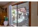 Backyard view from sliding glass door with pool and shade at 2232 E Inglewood St, Mesa, AZ 85213
