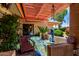 Tranquil courtyard featuring a water feature, bridge, and lush greenery, perfect for relaxation at 2232 E Inglewood St, Mesa, AZ 85213