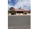 Charming single-story home with a tile roof, desert landscaping, and a welcoming entrance at 2232 E Inglewood St, Mesa, AZ 85213