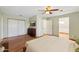 Spacious bedroom features a ceiling fan, closet, and adjoined room at 2455 E Broadway Rd # 68, Mesa, AZ 85204