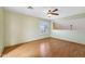 Bedroom features wood laminate flooring, recessed lighting, and ceiling fan at 2455 E Broadway Rd # 68, Mesa, AZ 85204