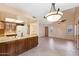 Dining area with easy access to kitchen and living room, creating a warm and open floor plan at 2455 E Broadway Rd # 68, Mesa, AZ 85204