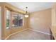 Cozy dining area featuring an abundance of natural light, and tile flooring at 2455 E Broadway Rd # 68, Mesa, AZ 85204