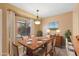 Comfortable dining room featuring a table for six, with natural light and bright walls at 2455 E Broadway Rd # 68, Mesa, AZ 85204