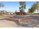 Community entrance sign for Summer Place Terrace with brick accents and flowering shrubs at 2455 E Broadway Rd # 68, Mesa, AZ 85204