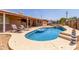Private backyard features a large pool, spa, covered patio, and space for outdoor activities at 25615 S Lemon Ave, Queen Creek, AZ 85142