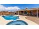 Backyard pool and hot tub featuring concrete patio at 25615 S Lemon Ave, Queen Creek, AZ 85142