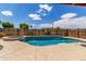 Sparkling in-ground pool with ample patio space, ideal for summer fun and recreation at 25615 S Lemon Ave, Queen Creek, AZ 85142