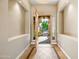 Light and bright entryway featuring an open door with views of the front courtyard at 2565 N 141St Ln, Goodyear, AZ 85395