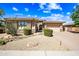 Inviting single-Gathering home with well-kept desert landscaping, stone accents, and a spacious three-car garage at 2565 N 141St Ln, Goodyear, AZ 85395