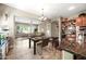 Open concept dining room that flows into the living room at 2565 N 141St Ln, Goodyear, AZ 85395