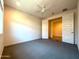 Inviting bedroom with carpet flooring and a ceiling fan for comfort and style at 2727 N Acacia Way, Buckeye, AZ 85396
