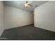 Cozy bedroom features a ceiling fan and ample natural light, perfect for resting at 2727 N Acacia Way, Buckeye, AZ 85396